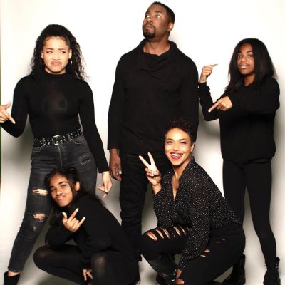 Photo of Gillian Iliana Waters and her husband, Michael Jai White along with their three daughters. 